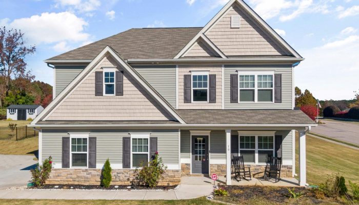 why do clean homes get pests in Katy suburban home exterior